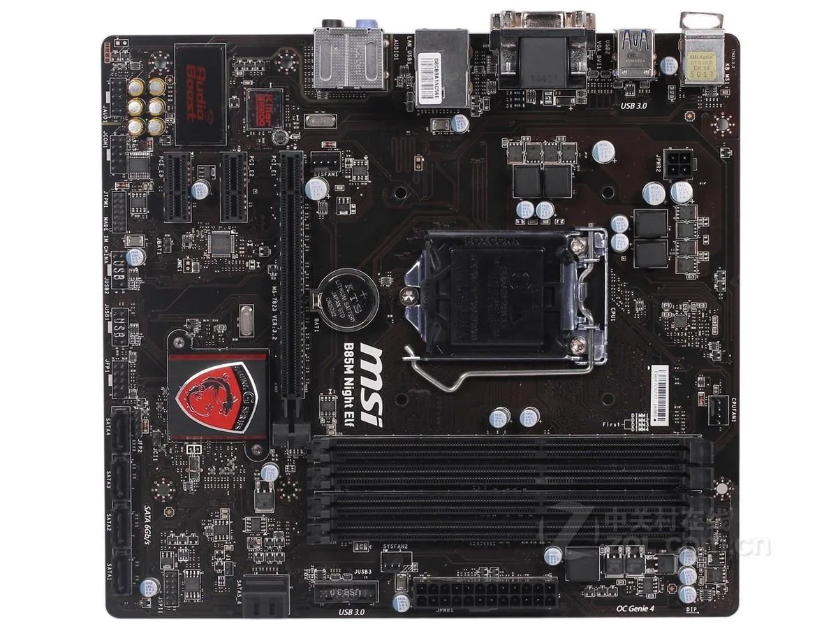 Green micro-ATX motherboard with black heatsinks and silver sockets