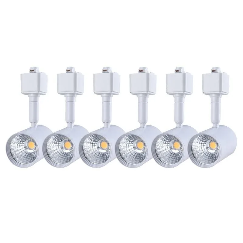 Six white cylindrical LED track heads with adjustable joints on a single-circuit rail