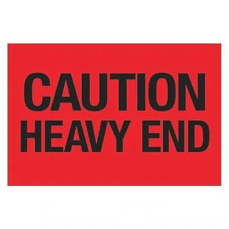 Roll of fluorescent red caution labels on white backing paper