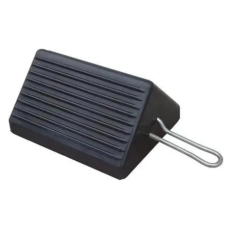 Black moulded rubber wheel chock with grooved tread and steel carrying handle