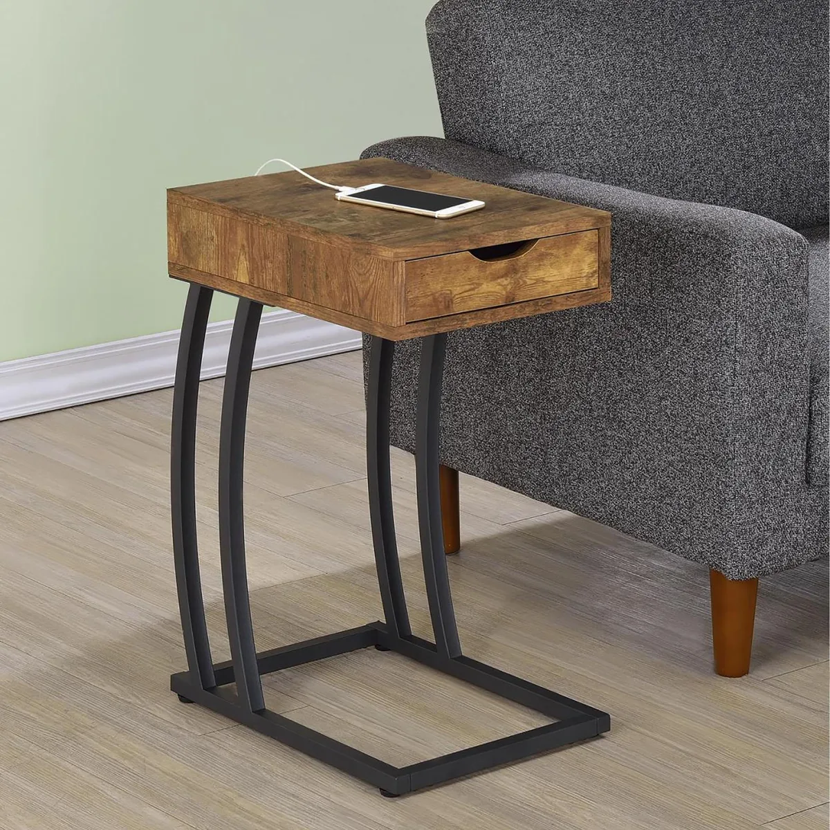 Wood occasional table with brown nutmeg top, dark metal frame, storage drawers and built-in power outlets