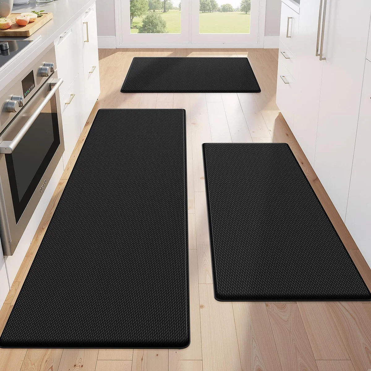 Three black rectangular PVC kitchen rugs, 17.3 by 30, 47, and 59 inches, 0.4 inch thick