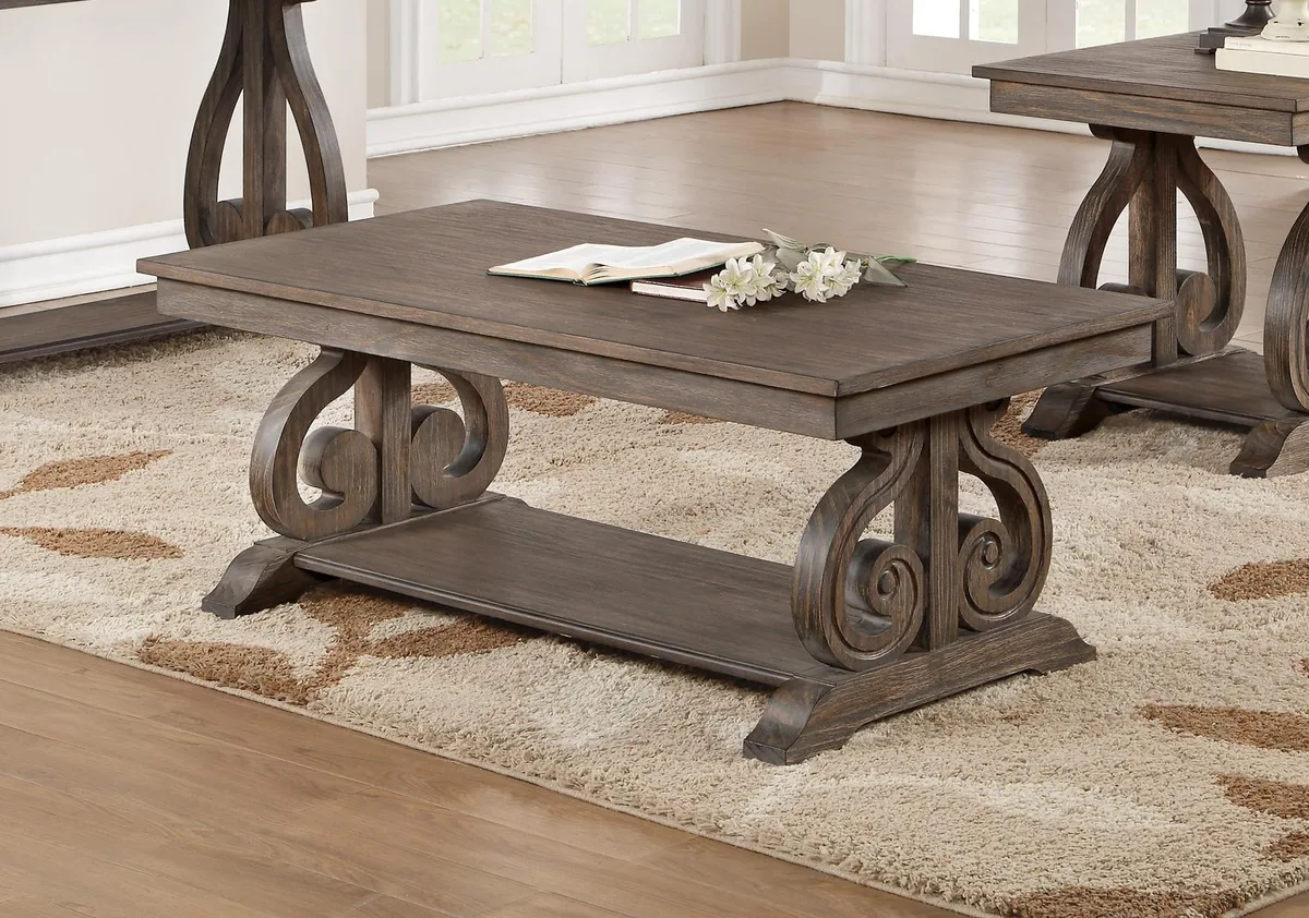 Rectangular dark oak coffee table with scrolled base and lower shelf