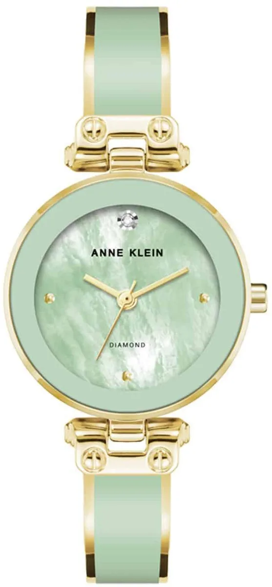 Anne Klein gold-tone 33 mm watch with forest green dial and matching mesh bracelet
