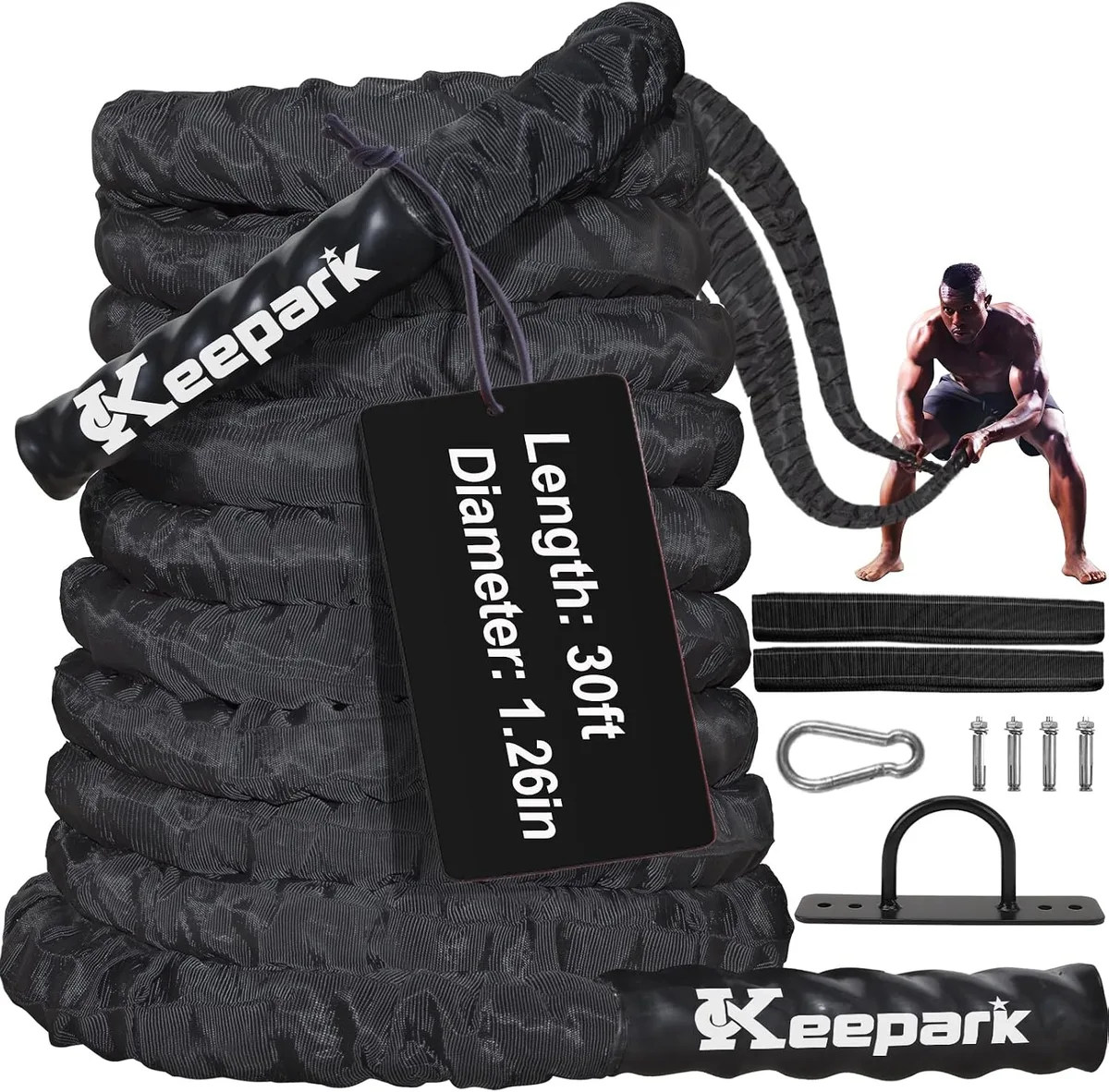 Thick black polyester battle rope with heat-shrink handles and protective sleeve, coiled on floor