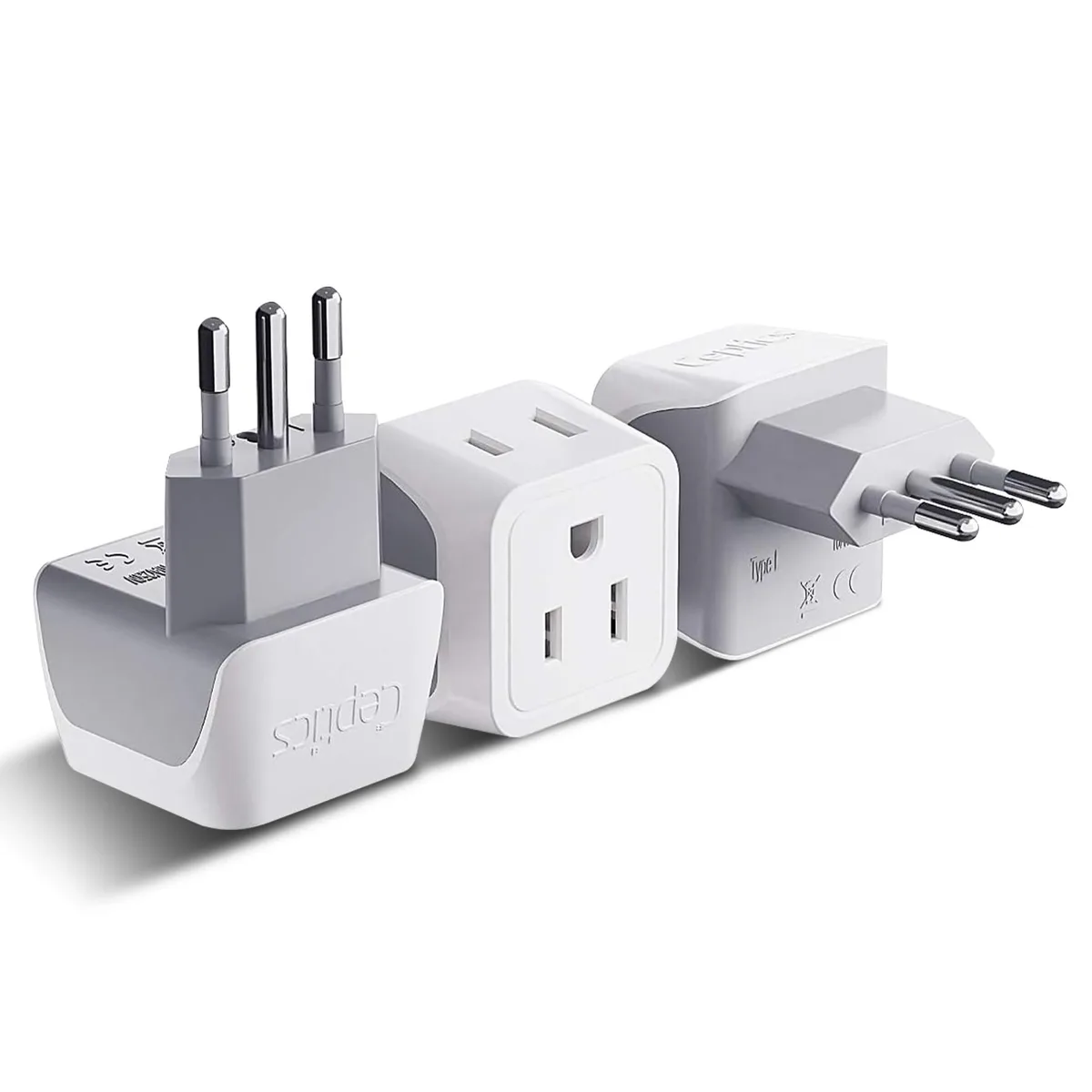 Three compact white Type L travel adapters with dual US sockets