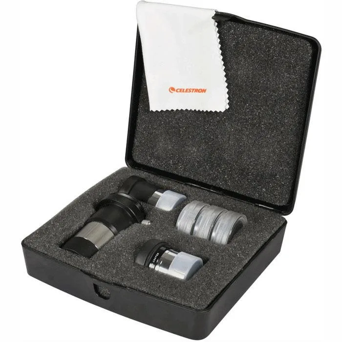 Black foam-lined case containing eyepieces, Barlow lens, coloured filters and cleaning cloth