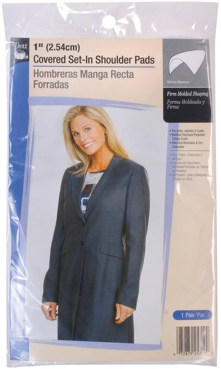 Pair of white covered shoulder pads, one inch thick, polyester taffeta over molded polyfoam