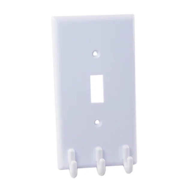 White standard switch plate with integrated hooks for keys and glasses