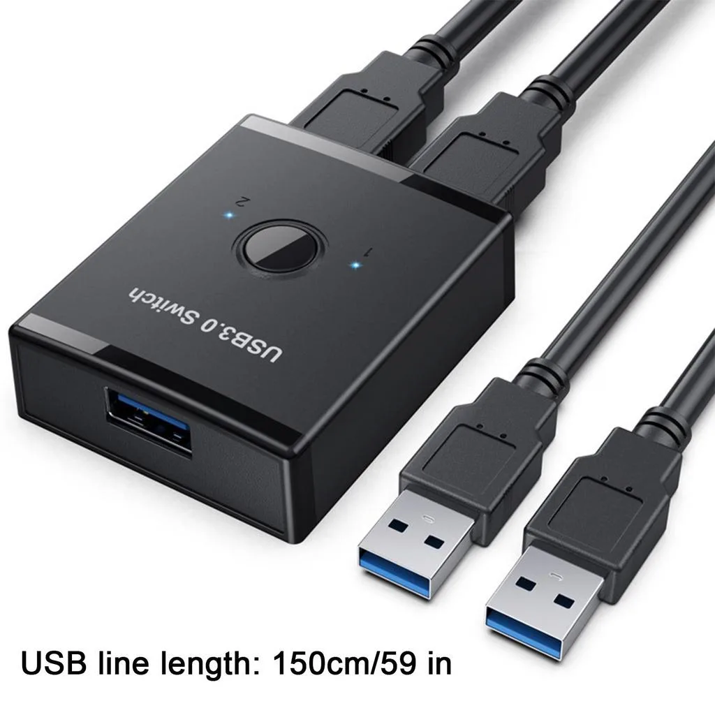 Black plastic KVM switch with two USB cables attached