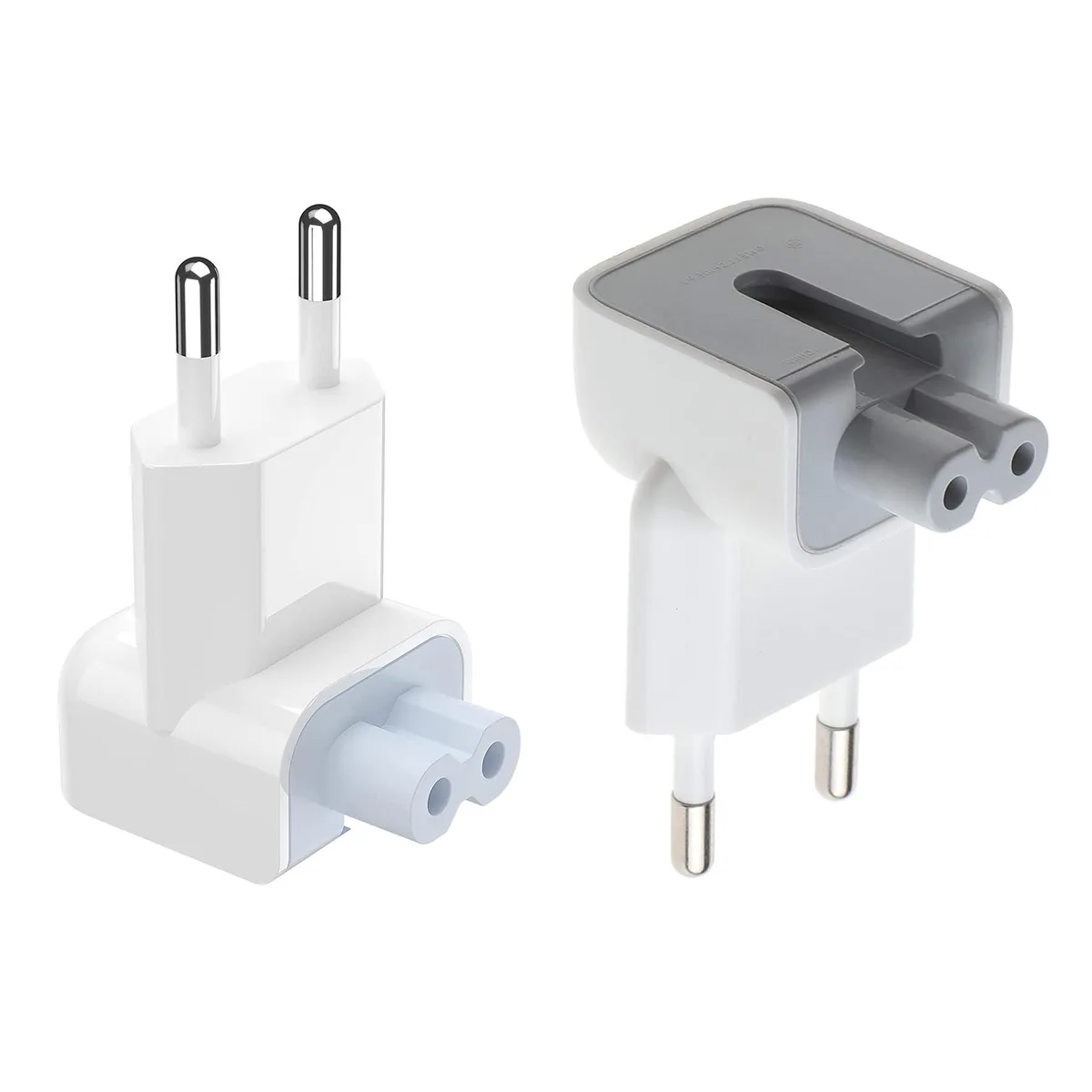 Two white Mac European plug adapters, compact duck-head style, side by side