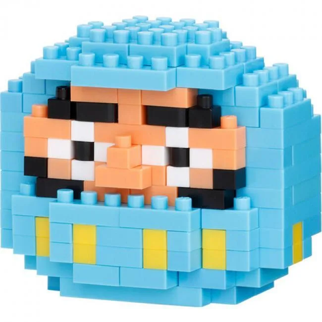 Small blue Daruma figure built from tiny bricks in a box