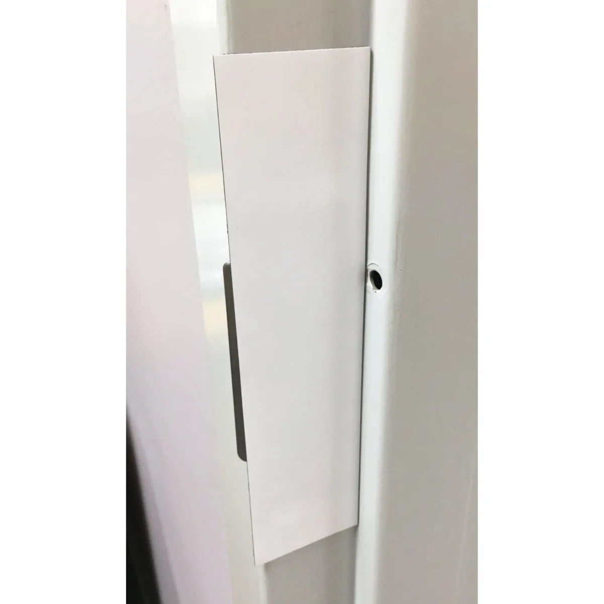 Ten flexible white magnetic strips, each 2 by 8 inches, stacked in a pack