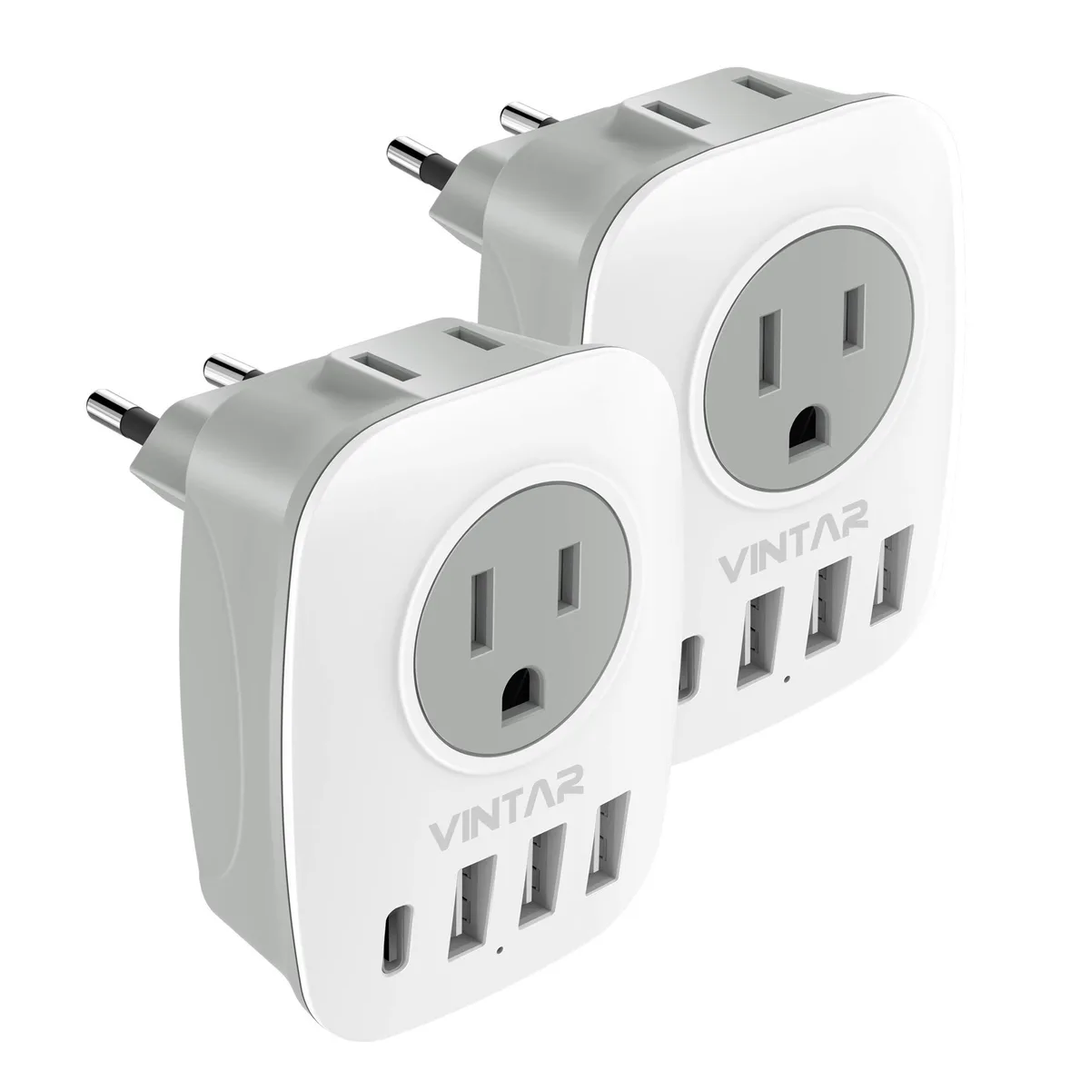 Two white-grey European travel adapters with USB-C and USB-A ports