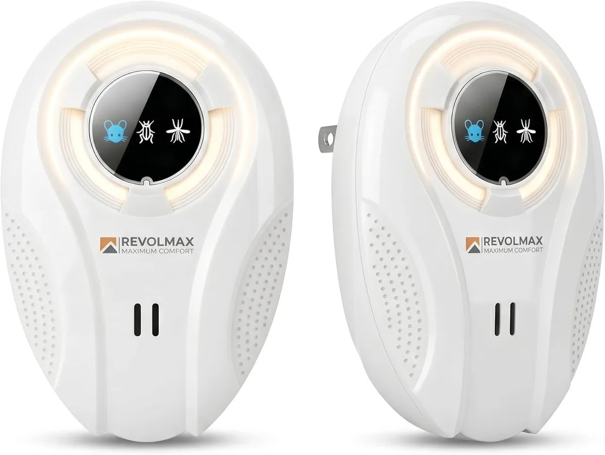 Two white rectangular plug-in pest repellers with front grilles and status LEDs