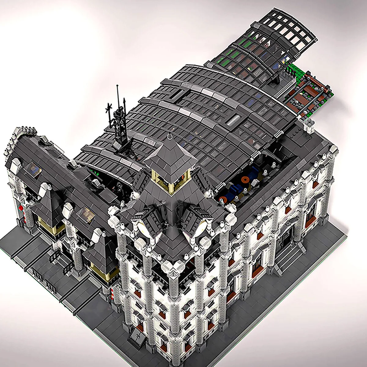 Large white modular train station building set with 12698 plastic bricks and detailed interior