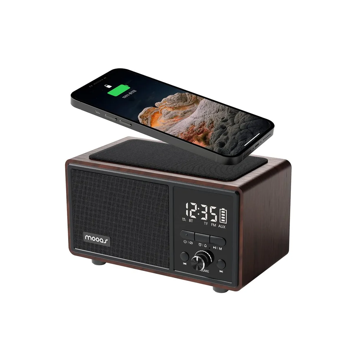 Retro-styled black digital clock speaker with wireless charging pad on top, compact rectangular shape