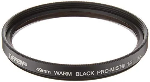 Round 62 mm camera filter with silver-sparkle glass in a black metal ring