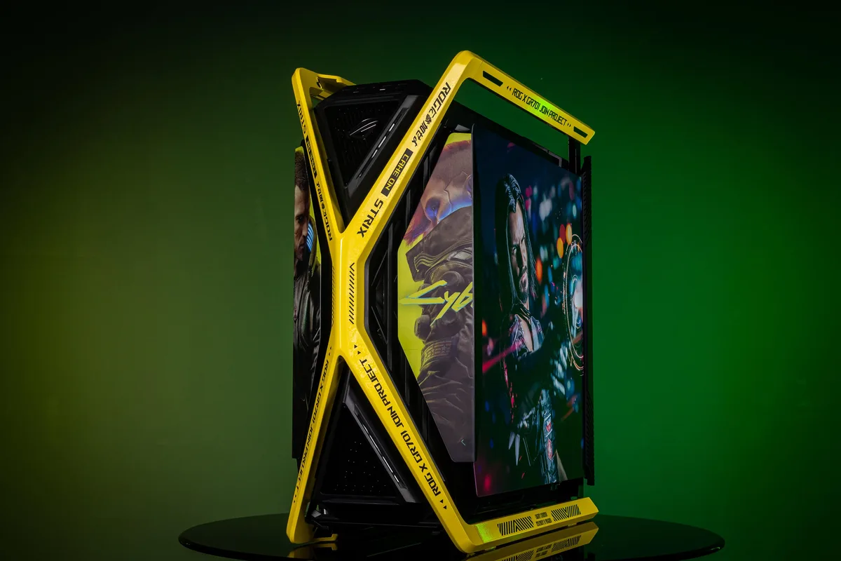 Yellow full-tower E-ATX case with dual tempered glass panels and four 140 mm fans