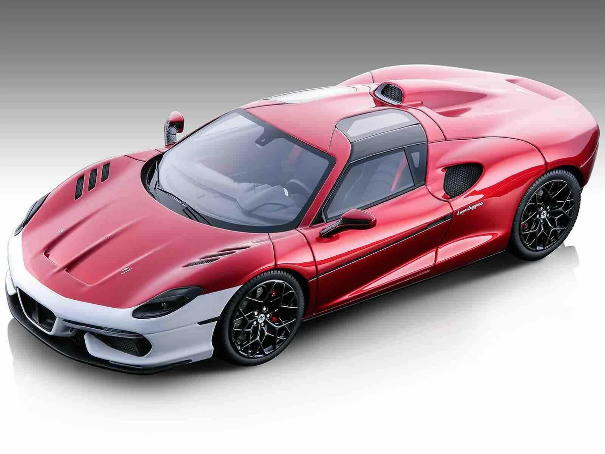 Red metallic 1/18 scale resin model car with white accents, detailed exterior and interior, rubber tires, no openings