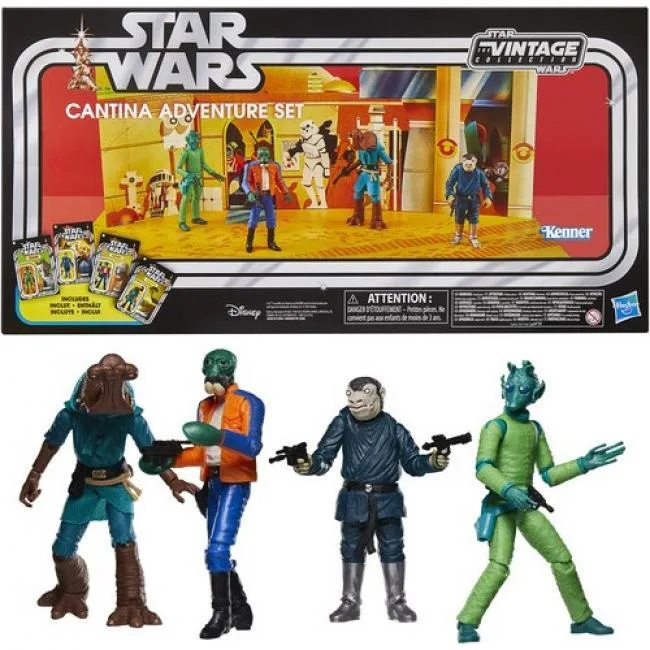 Four 3.75-inch Star Wars Cantina alien figures in vintage Kenner-style packaging