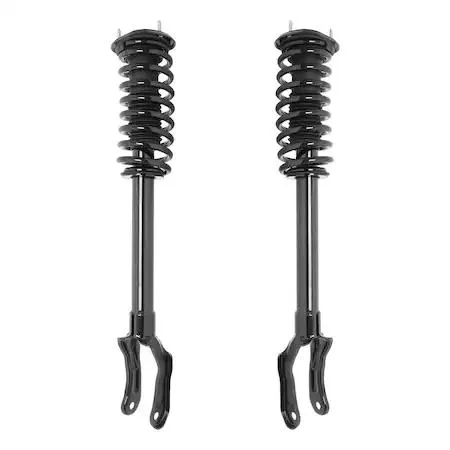 Pair of silver front strut assemblies with coil springs and top mounts, new in box