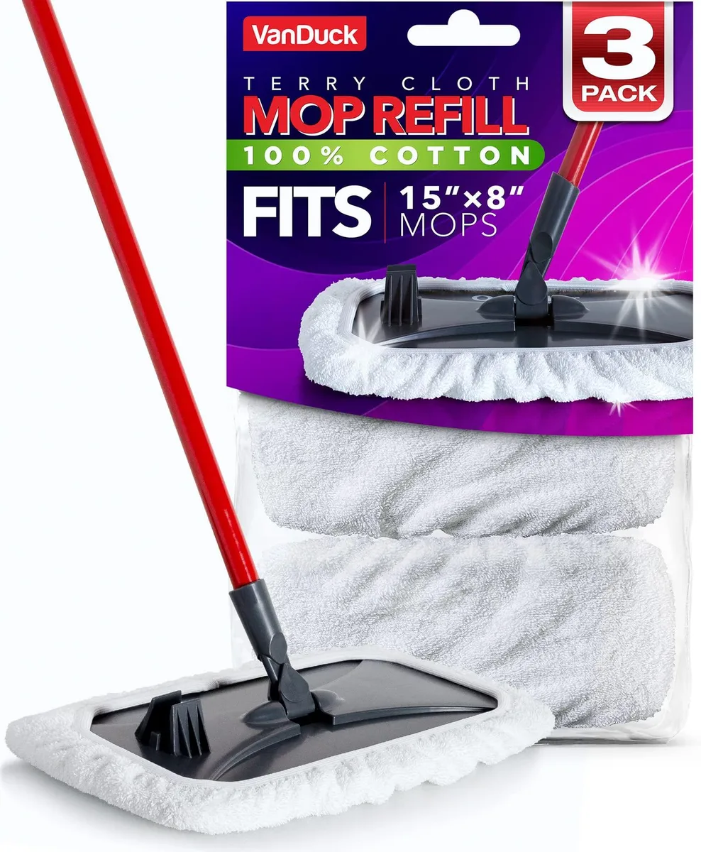 Three white cotton terry mop pads folded flat