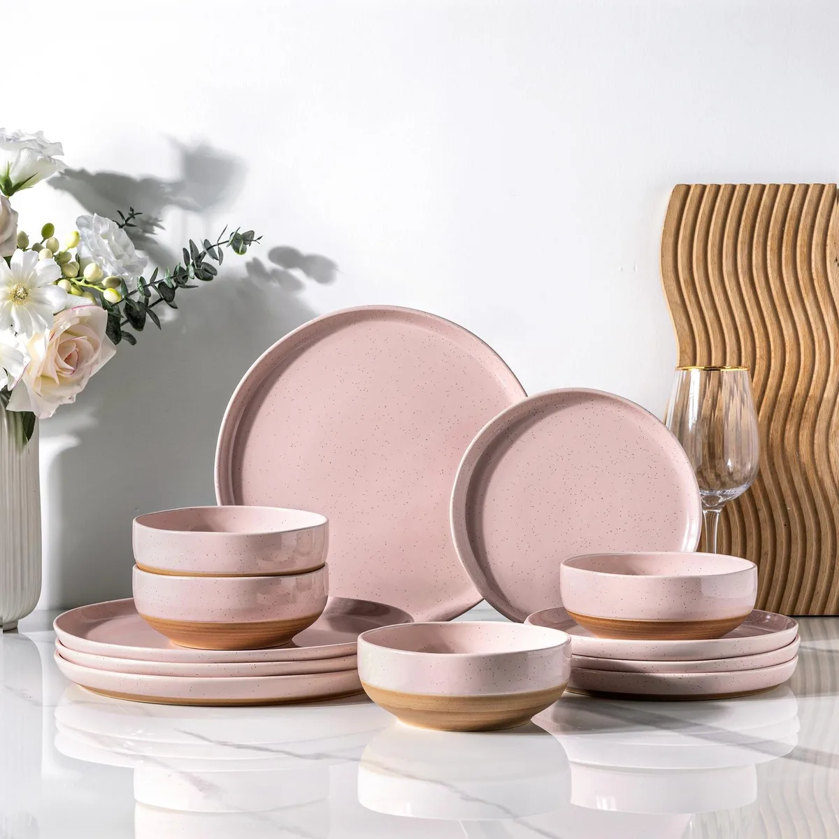 Square ceramic dinnerware set in cloud pink with glossy finish and wavy rim