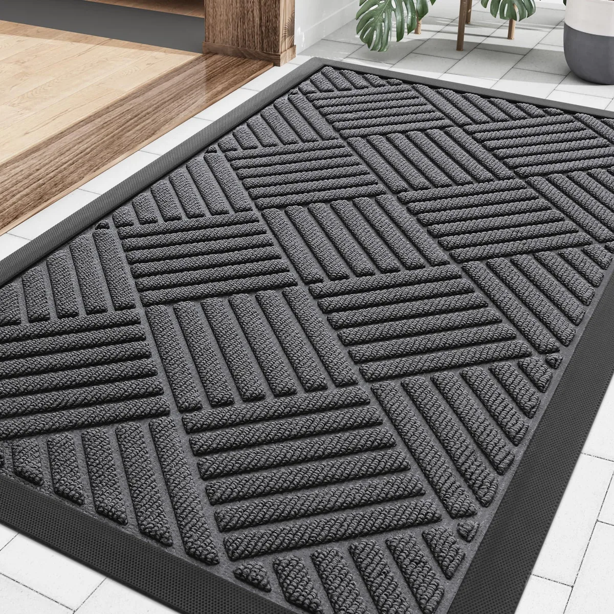 Grey striped bamboo doormat with rubber backing, low-profile rectangular shape, 29.5 by 17 inches