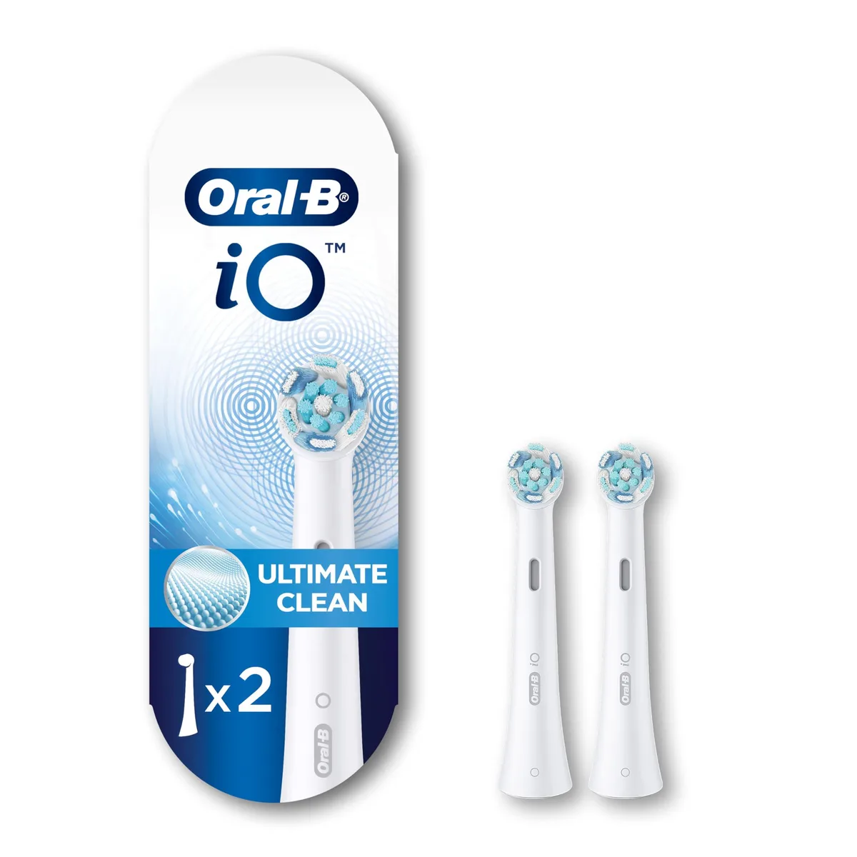 Two white oval brush heads with soft nylon bristles in clear packaging