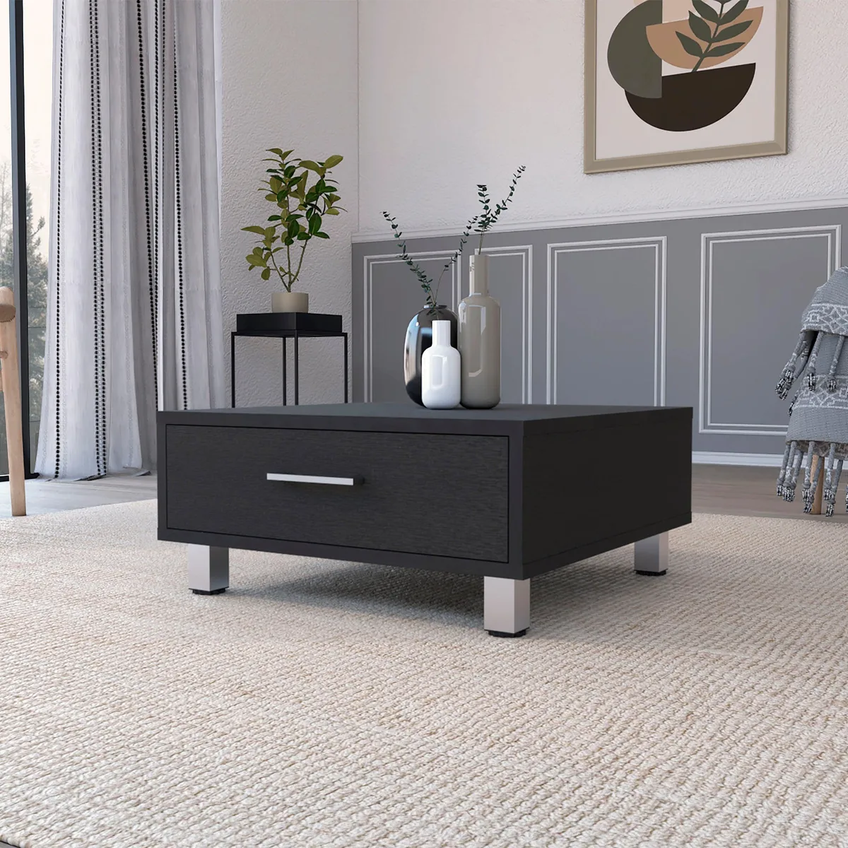 Square black engineered wood coffee table with four metal legs, one drawer and metal handle
