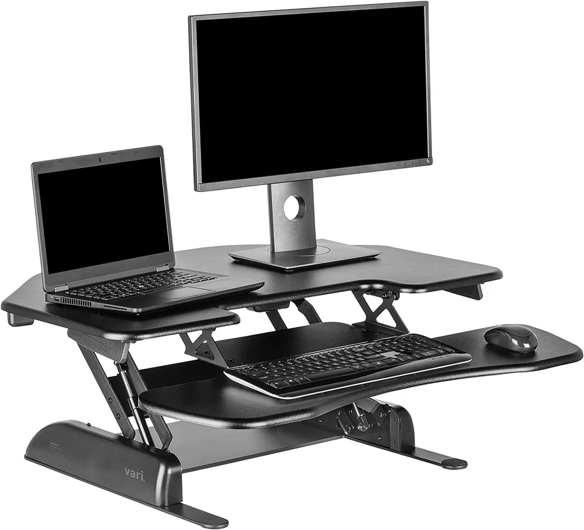 Black corner desk converter with two tiers, spring-assisted lift handles and weighted base