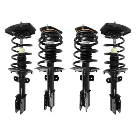 Four silver strut assemblies with black coil springs and silver mounts