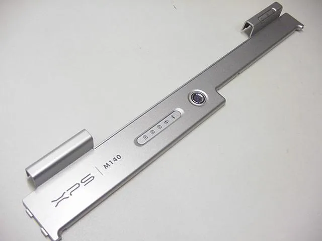 Dell XPS M140 power button cover FF279, silver plastic strip with raised button