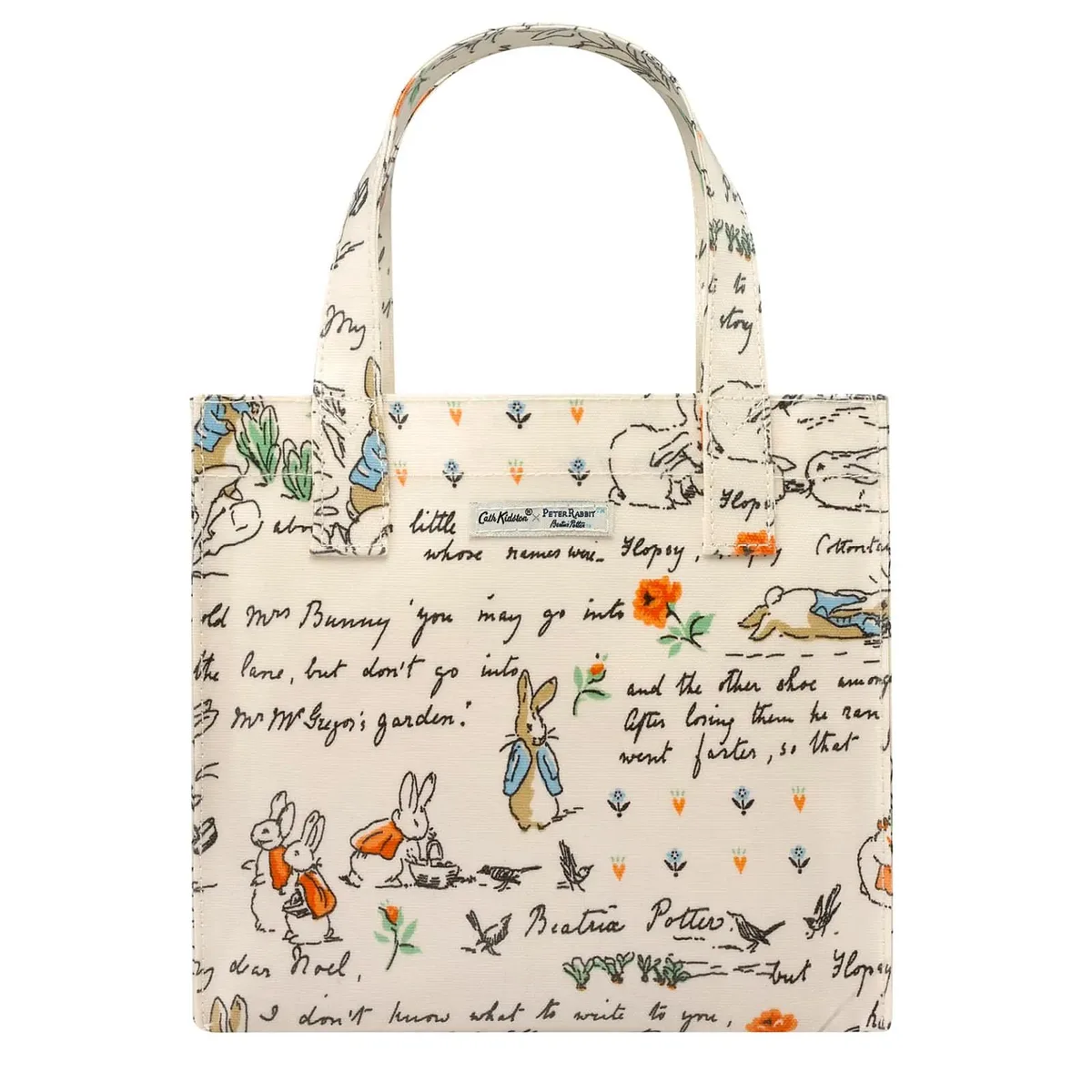 Cream water-resistant oilcloth bookbag with Peter Rabbit floral print, open top, dual handles