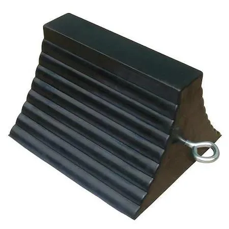 Black rubber wheel chock with grooved tread and steel eyebolt