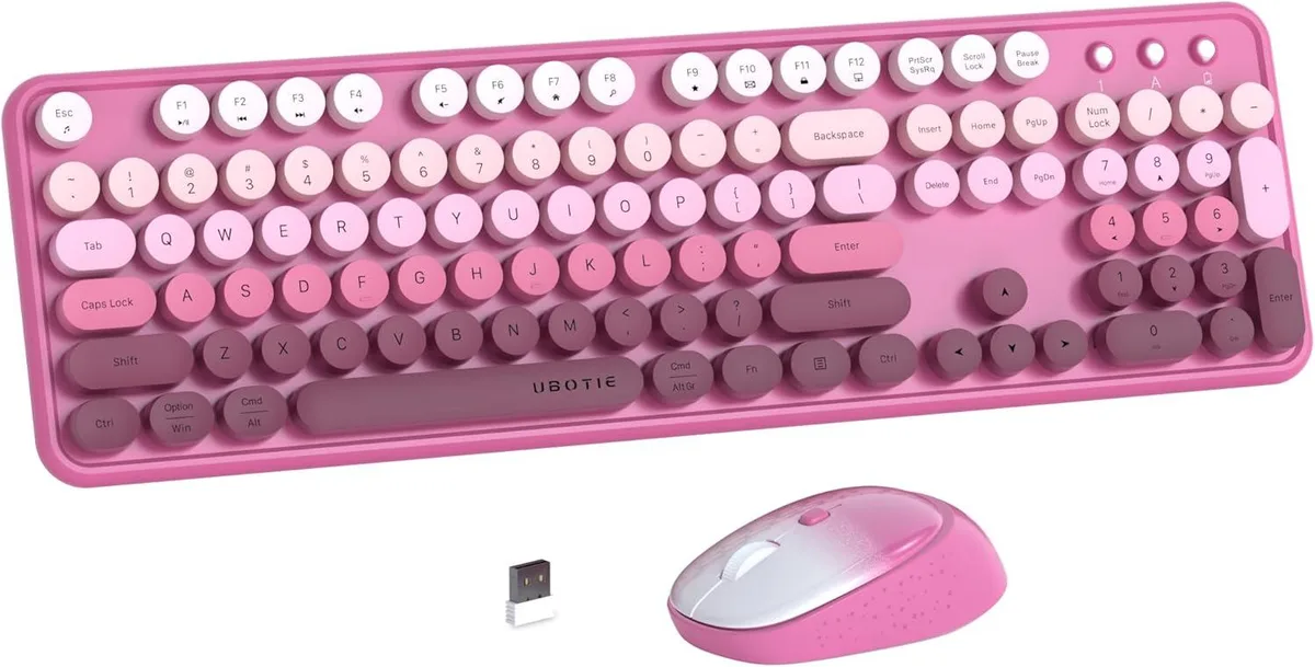Full-size wireless keyboard and mouse in rosy gradient finish with round keycaps and mirror surface