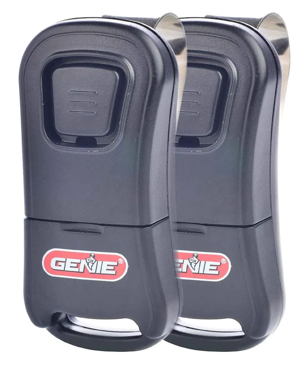 Two black single-button remotes with visor clips