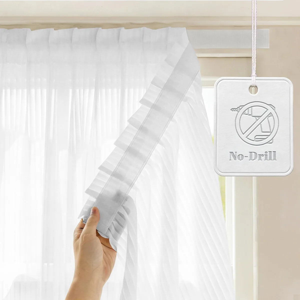White sheer curtain panel 39 inches wide by 63 inches long with adhesive backing