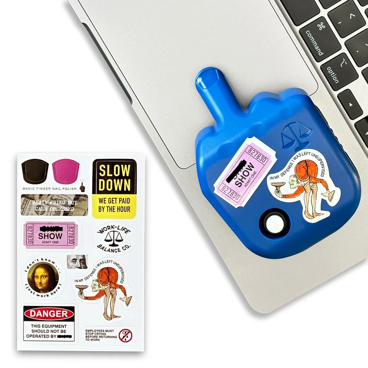 Black rectangular mouse pad with a small battery-powered mechanical jiggler module attached