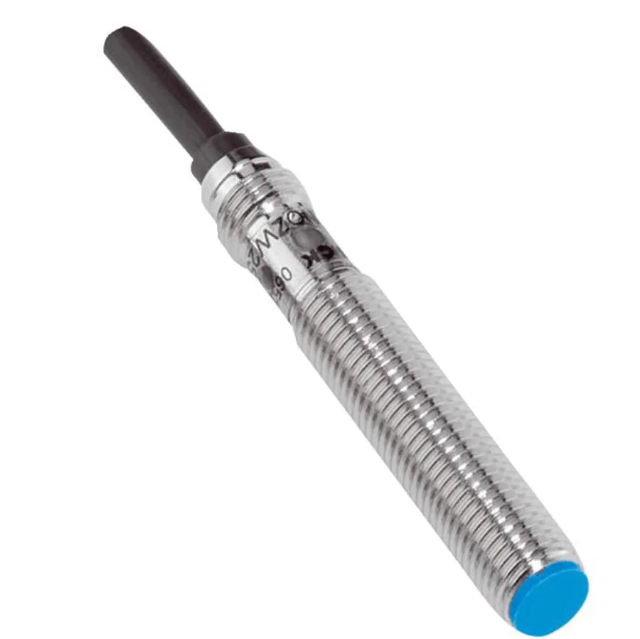 Small cylindrical metal sensor with threaded body and attached cable