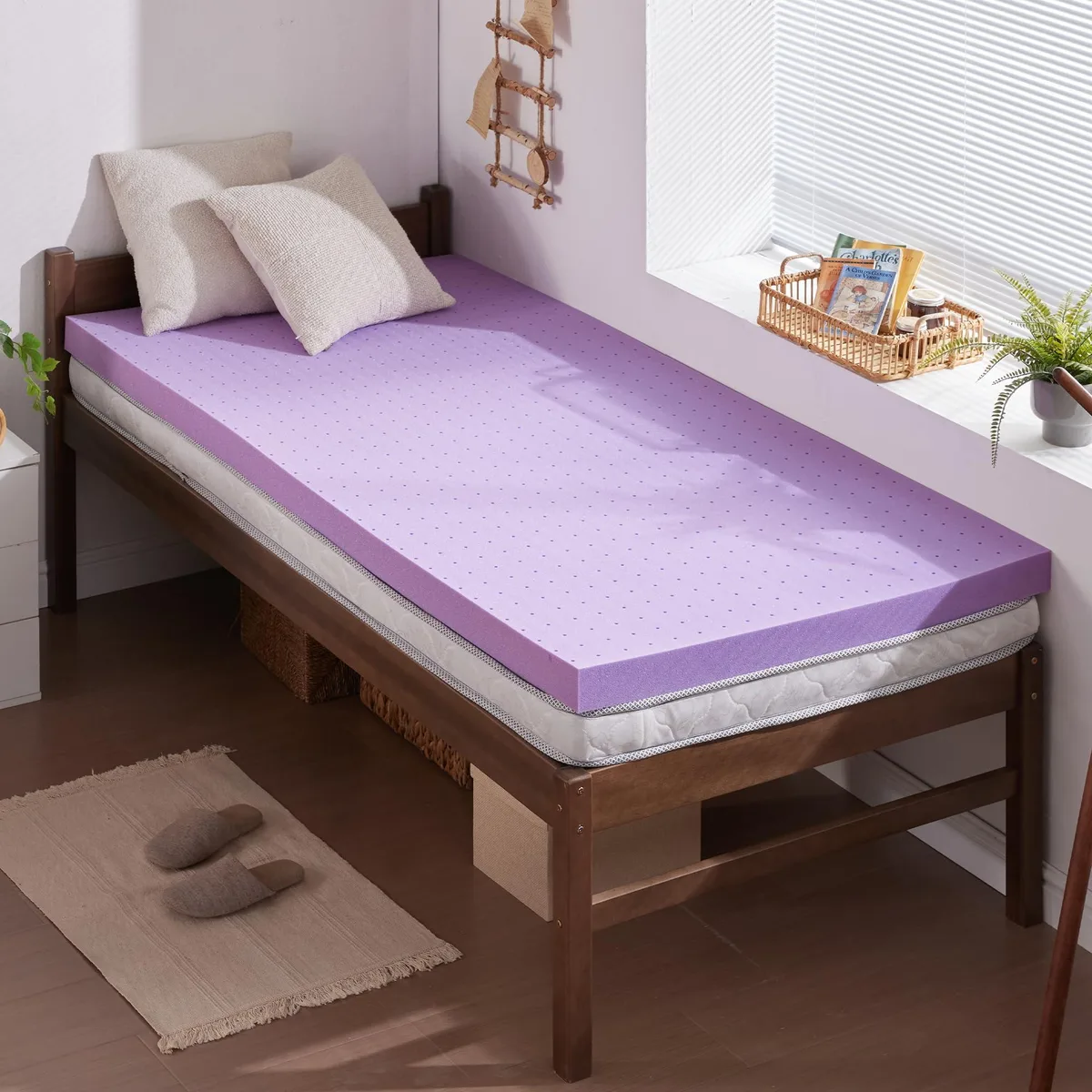 Twin-size gel memory foam topper, two inches thick, purple ventilated surface, compressed in box