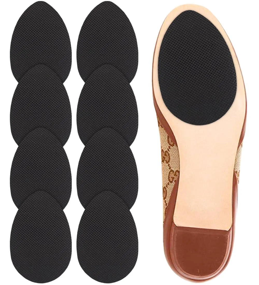 Four pairs of thin black adhesive silica-gel sole protectors on clear backing sheets