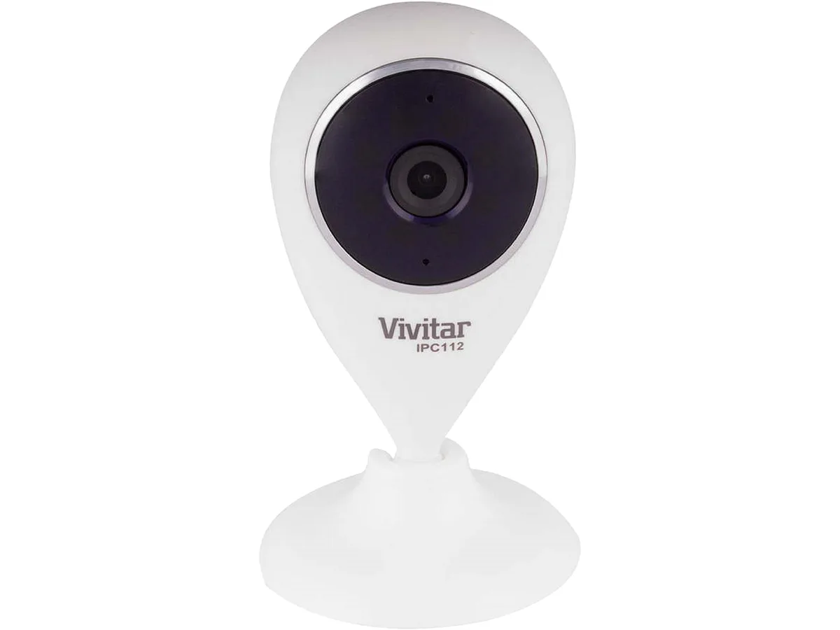 White compact network camera on a flat surface
