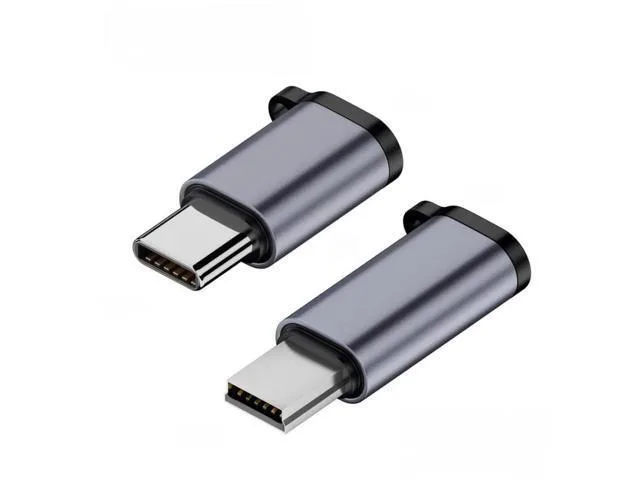 Two small adapters with USB-C and Mini USB plugs on one end and Micro USB sockets on the other