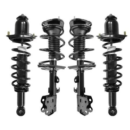 Four silver strut assemblies with black coil springs, pre-assembled for 2005-2009 Toyota Prius