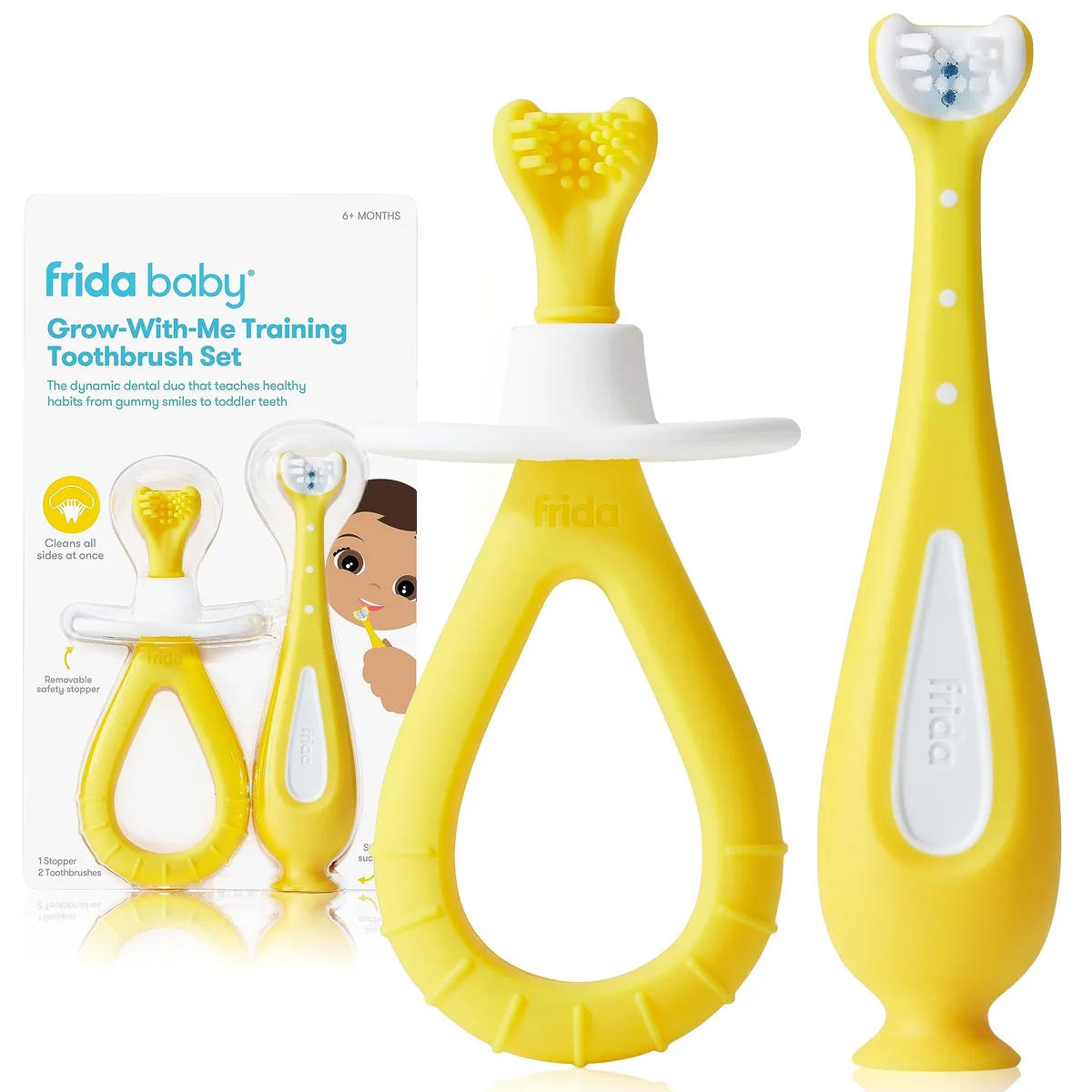 Two yellow silicone baby toothbrushes with triple-angle bristles and easy-grip handles