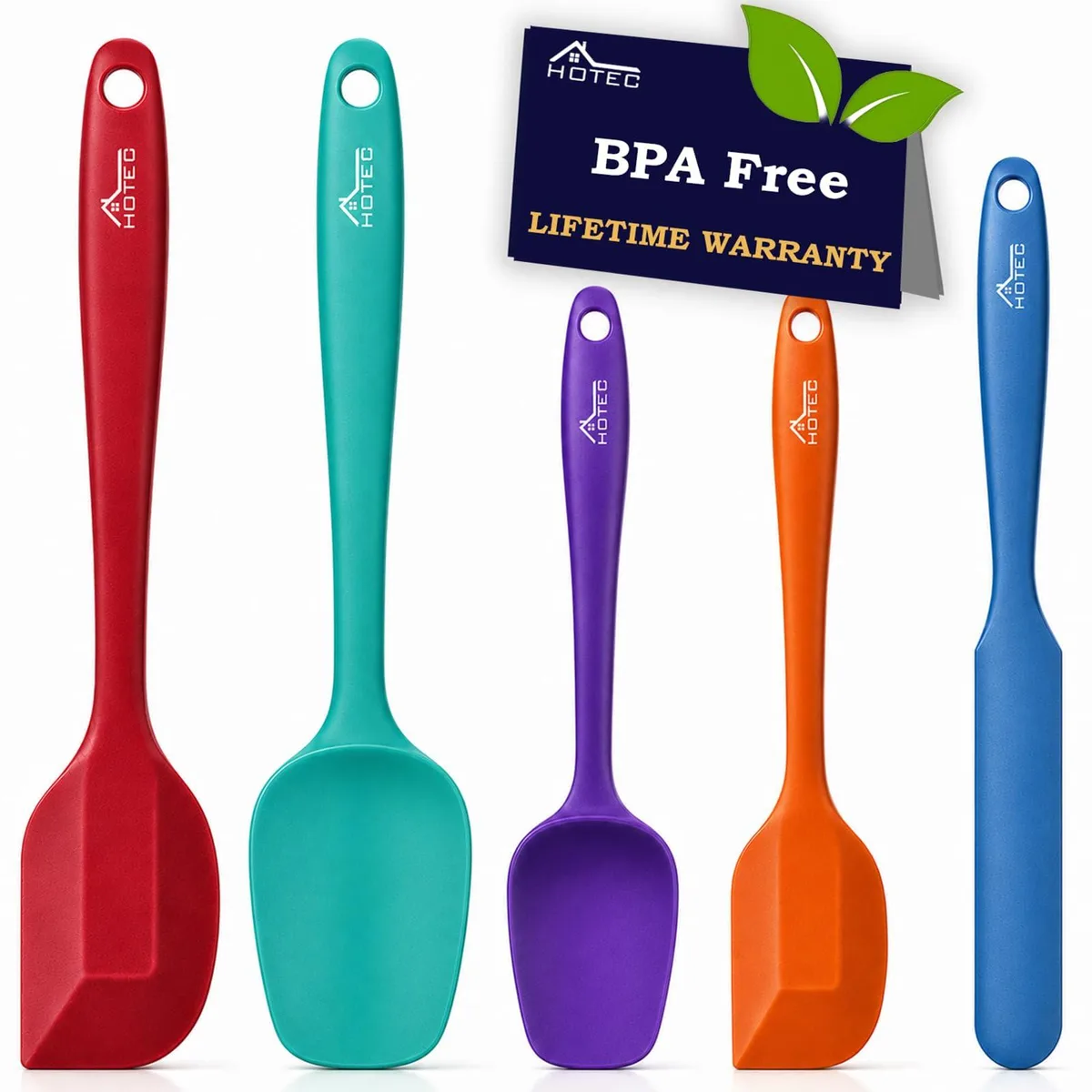Five silver silicone spatulas with bamboo handles on a plain background