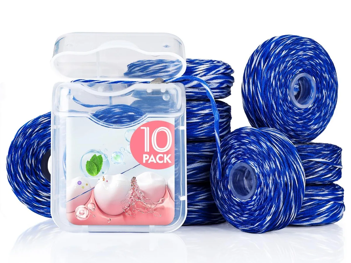 Ten mint floss spools in a clear snap-on box