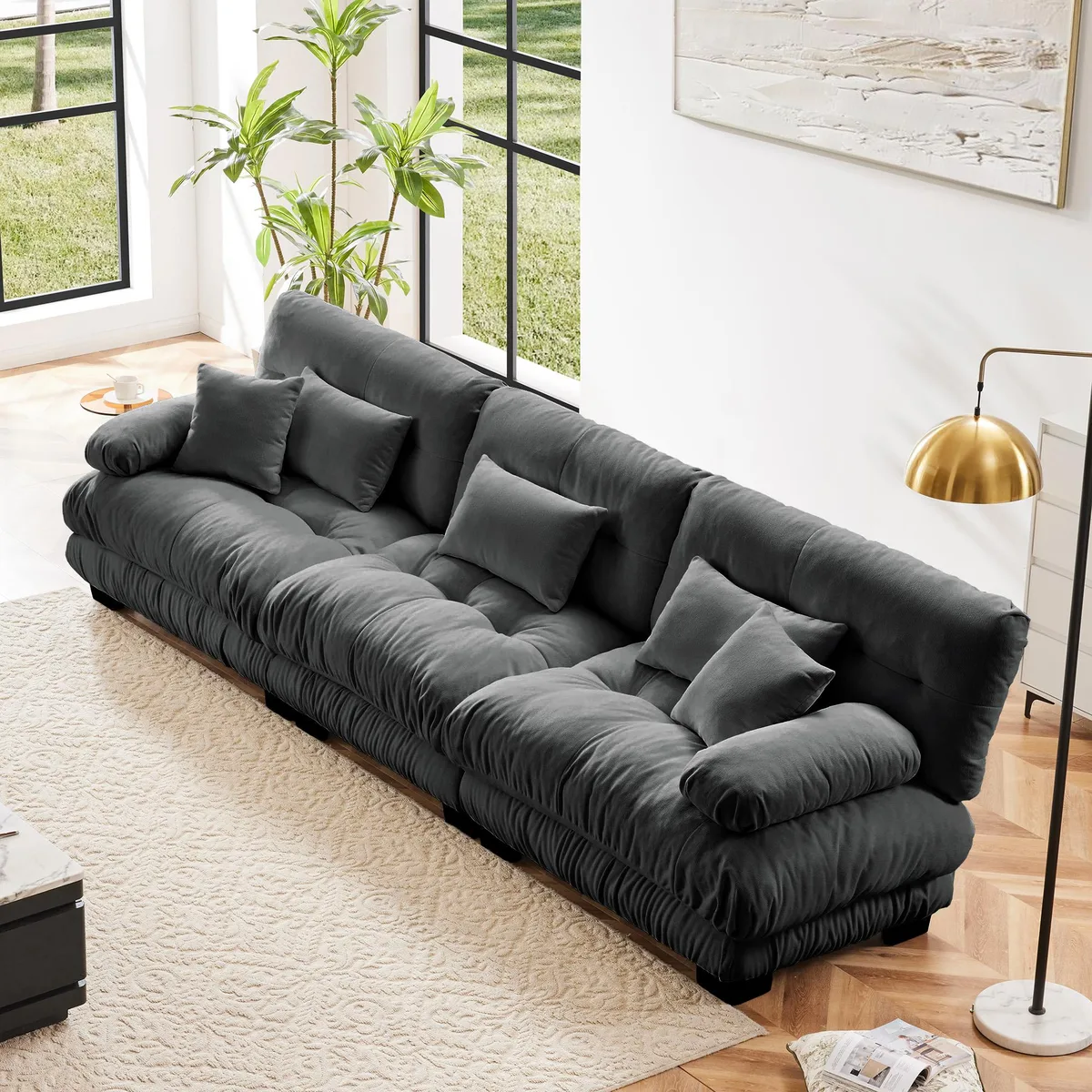 Gray chenille three-seat modular sectional with deep cushions and round bolster arms